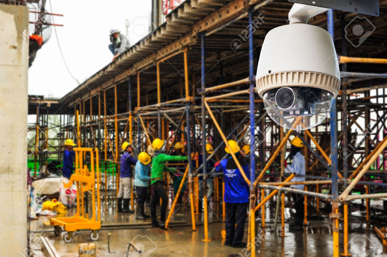 CCTV camera operating at a construction site, mounted on exterior structure for site monitoring.